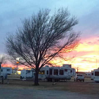 RVs parked at sunset at PnK RV Park