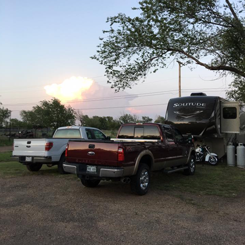 Trucks and RV in the Park